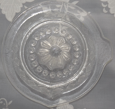 Diamond pattern clear glass juicer top view