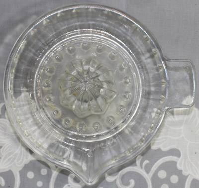 Top veiw of a Clear glass 30 panels juicer