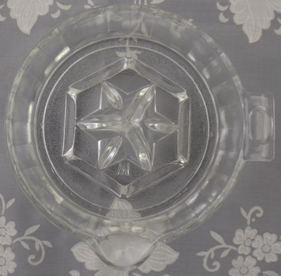 Hazel Atlas embossed clear glass juicer top view
