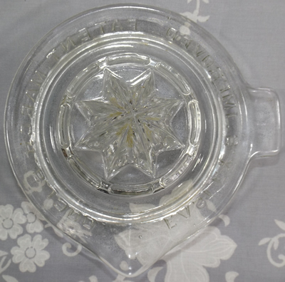 Top view Easley's improved patent clear glass juicer