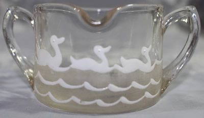 Fenton 2 piece clear glass with white ducks juicer front view