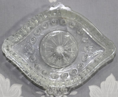 Top view of a trapizoidal shape clear glass juicer