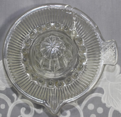 Lipped clear glass juicer