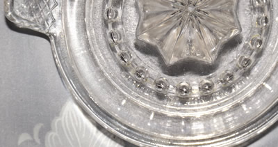The embossed BRITISH ® MANUFACTURE opposite the pouring spout
