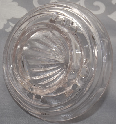 Bottom view of the reamer for a hexagonal panels 2 piece clear glass juicer