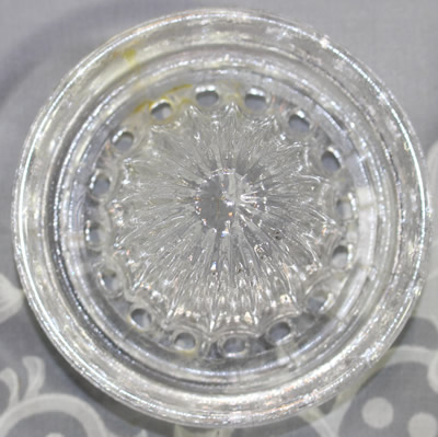 An alternate reamer for a Westmoreland Specialty Co. clear glass 2 piece cup juicer