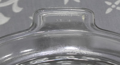Showing the plain bowl and the "FRANCE REIMS" on a clear glass juicer