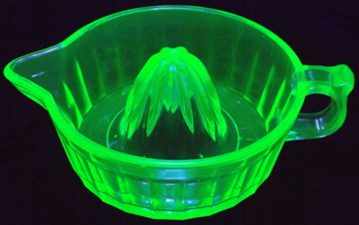 Indiana Glass Green (Uranium) juicer under UV light