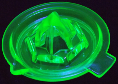 Barlett Collins green (Uranium) glass saucer juicer under UV light