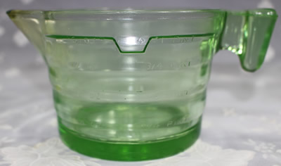 The jug the U.S.Glass Co. Handy Andy Green glass juicer