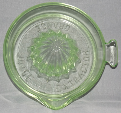 Embossed ORANGE JUICE EXTRACTOR green glass juicer