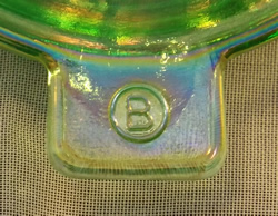 Edna Barnes' B in a circle logo
