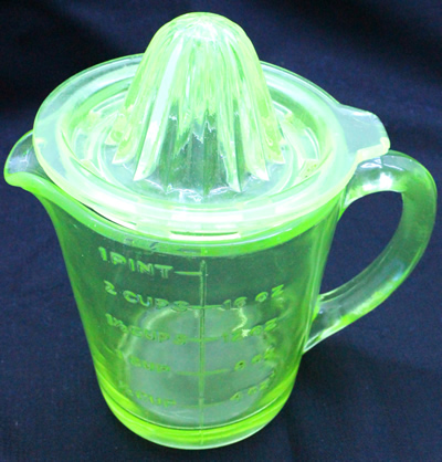 1 pint Crown Crystal green uranium glass juicer jug set under UV light 