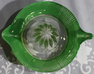 Top view of a Crown Crystal Australia fired on green tear drop handle juicer