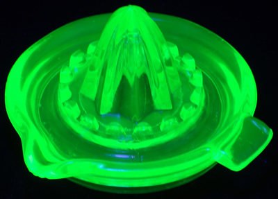 Green Uranium glass juicer with flat top pip collectors under UV light