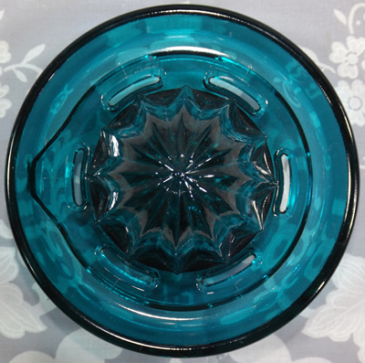 Reamer for Ultramarine glass juicer embossed with a lemon and an orange