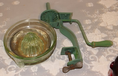 A complete Mount Joy green glass juicer attachment 