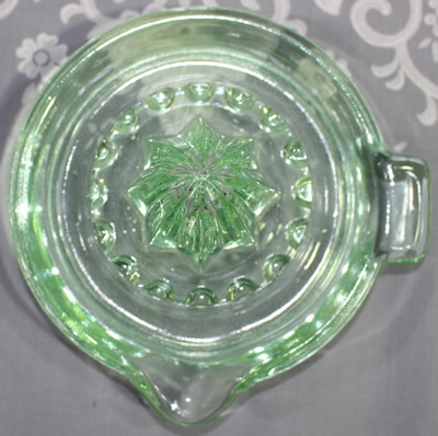 Green Uranium glass juicer with flat top pip collectors top view