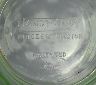 The embossed base for a no measurements U.S.Glass Co. Handy Andy Green glass juicer