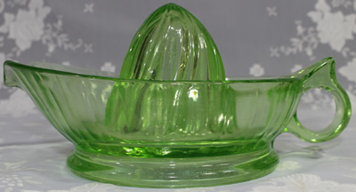 Side view of green loop handle Jeannette Glass juicer