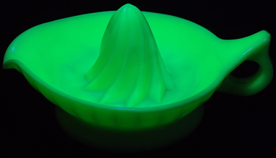 Small jadeite Jeannette juicer under UV light