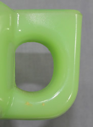 The round handle on a jadeite SUNKIST juicer