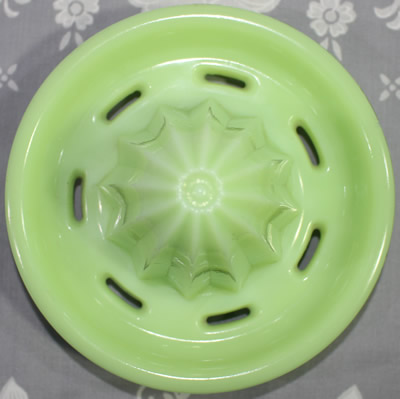 Top view of a Jeannette jadite juicer insert