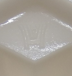 Hazel Atlas white milk glass juicer embossed logo