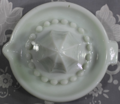 Green glass juicer attachment top view
