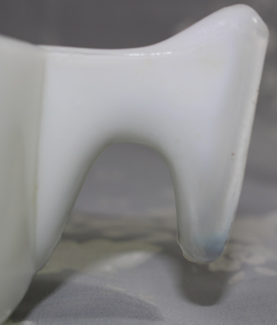Partially clear handle of U.S.Glass Company white milk glass juicer