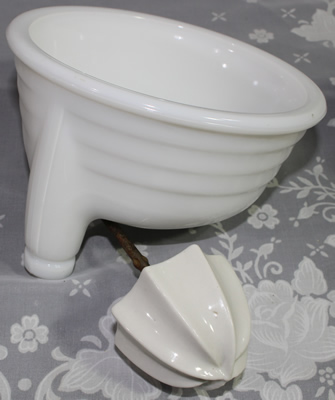 The reamer insert for a ribbed white milk glass juicer attachment