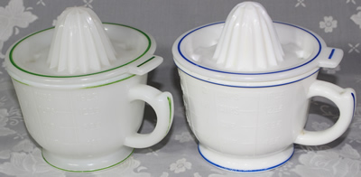 Piar of Hazel Atlas white milk glass with green and blue band juicers