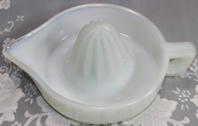 Showing the opalescence in the glass SUNKIST juicer