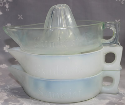 Showing three levels of opalescence on glass SUNKIST juicers 