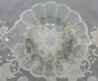 Top view of an opalescent H.C. Fry Company jelly mould (or jello mold) juicer
