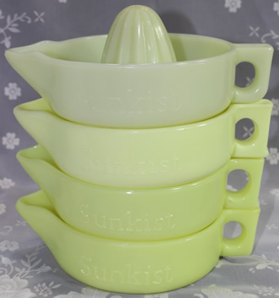 4 different 'yellow' Sunkist juicers 