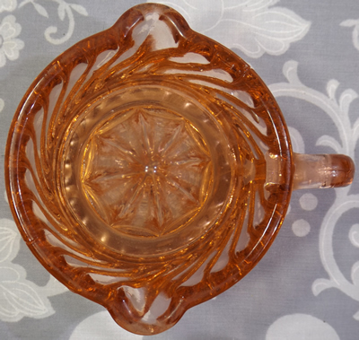 Off pink glass spiral juicer top view
