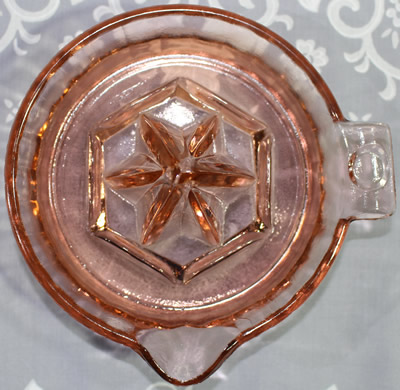 Hazel Atlas unembossed pink glass juicer top view