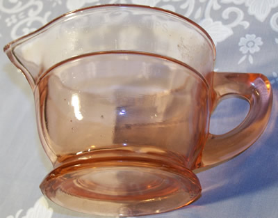 Back of U.S. Glass pink glass juicer jug