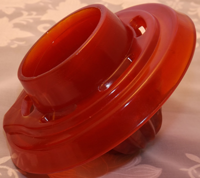 Red slag glass juicer under top