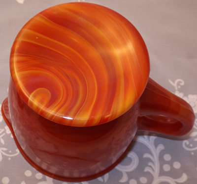 Red slag glass juicer jug bottom