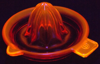 Red glow Edna barnes 4½" juicer under UV light