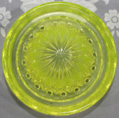 Reamer for yellow Uranium Gillespie Measuring Cup with a reamer top juicer