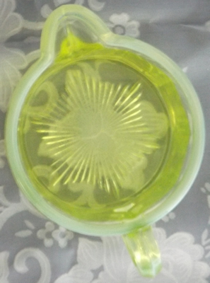 Top view of the jug for a frosted trim yellow Edna Barnes cup juicer