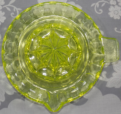 Top view of a Uranium yellow saucer embossed reproduction juicer