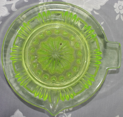 Top view of Citrine (uranium yellow) shape saucer juicer