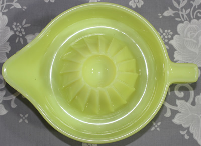 Top view of a seville yellow McKee Glass Co. juicer