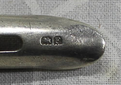 A second set of hallmarks on an Adie and Co Sterling Silver juicer