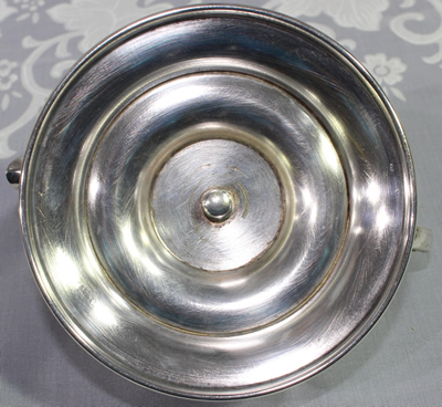 Bottom view silver plate cup juicer