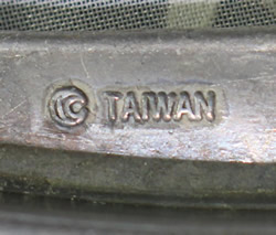 Marks on a Taiwanese aluminium wedge juicer